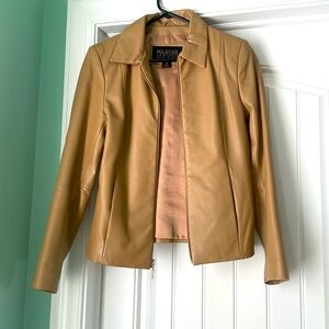 Leather jacket in great condition; soft leather side slit pockets